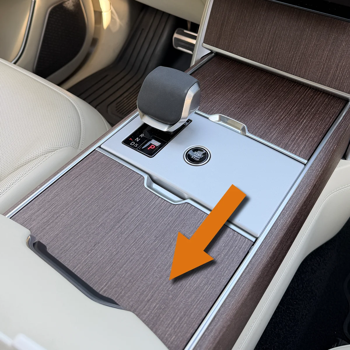 Range Rover cupholder cover sliding back