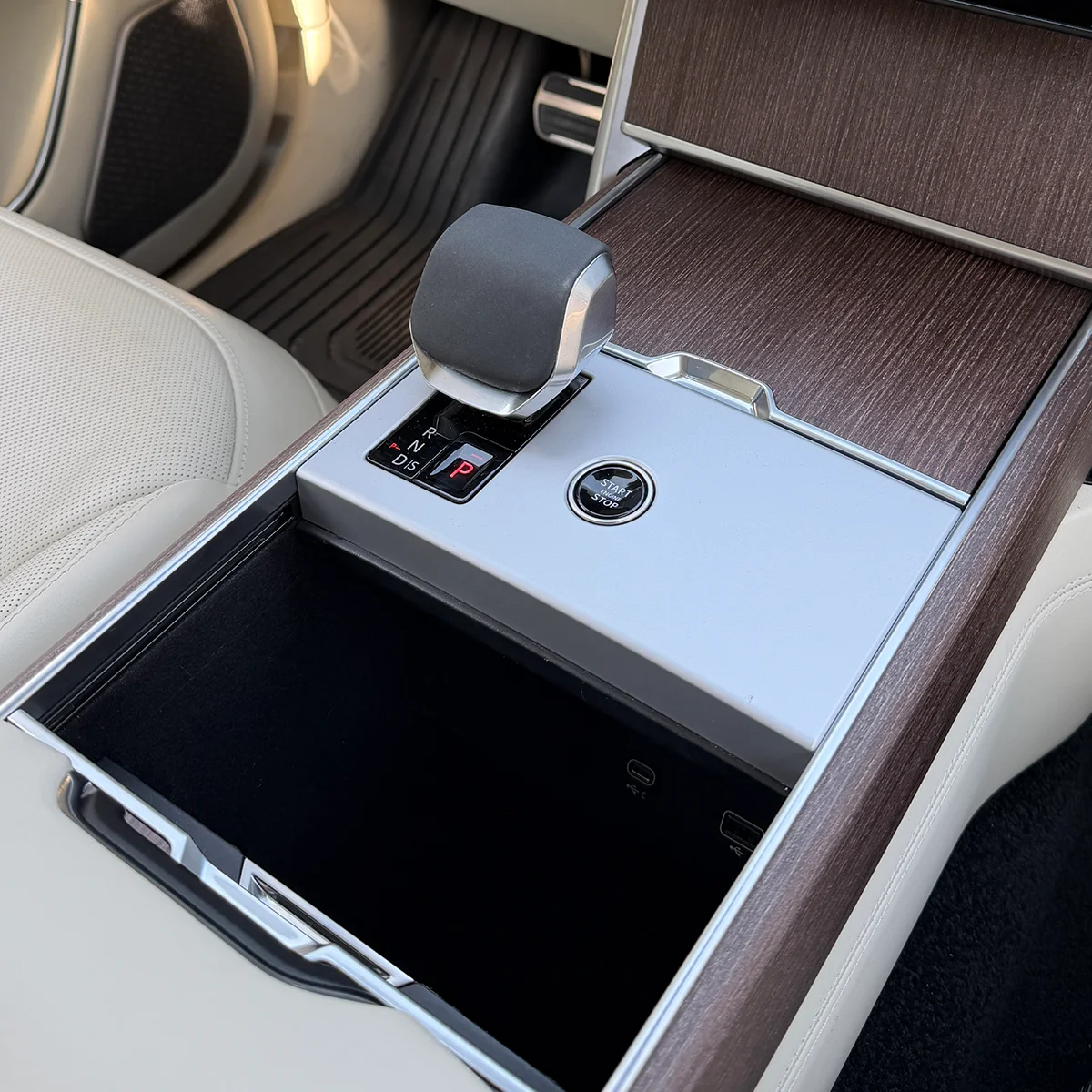 Range Rover hidden storage area opened and empty before installation