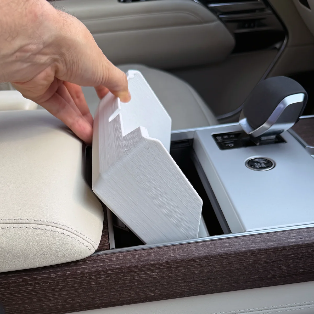 Range Rover Hidden Storage Organizer guided farther into the compartment