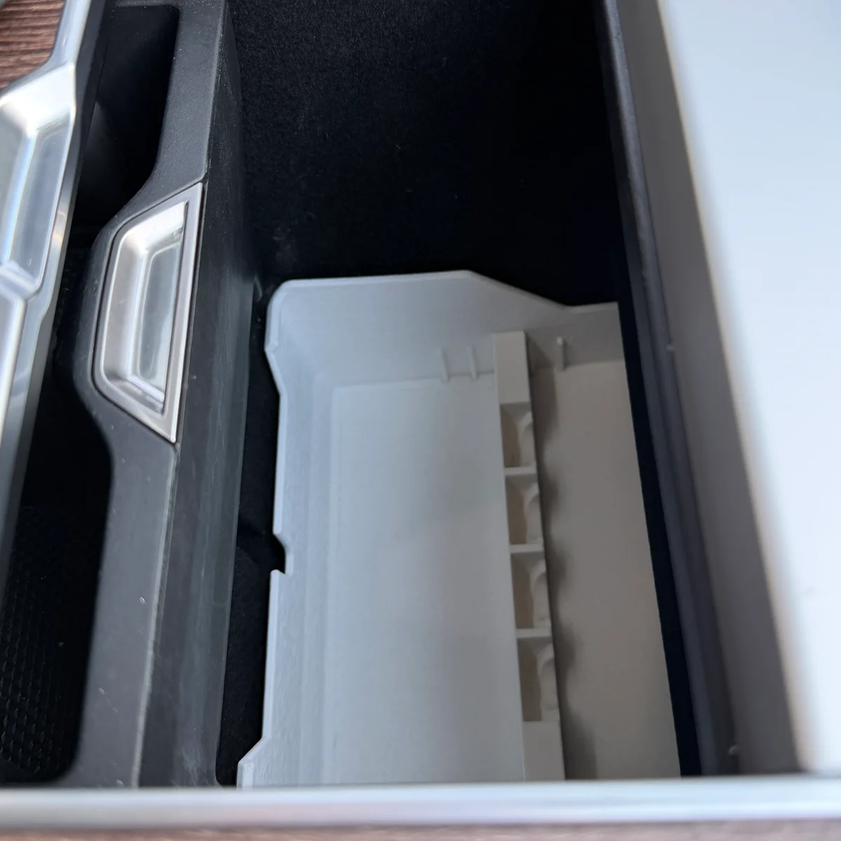 Range Rover Hidden Storage Organizer fully seated in the compartment