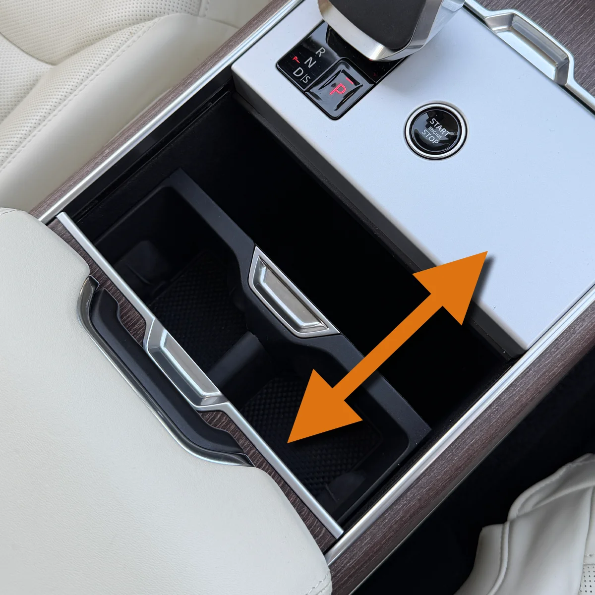 Range Rover cupholder section sliding forward and backward above the organizer